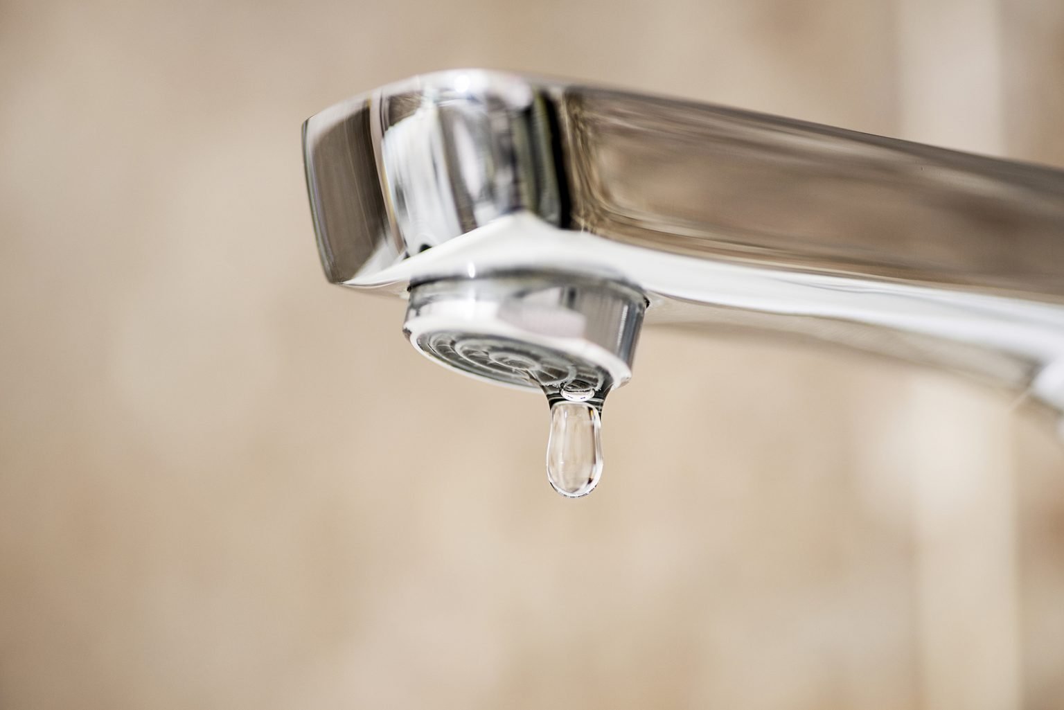 Faucet With Dripping Water. Tap Closeup With Dripping Water-drop
